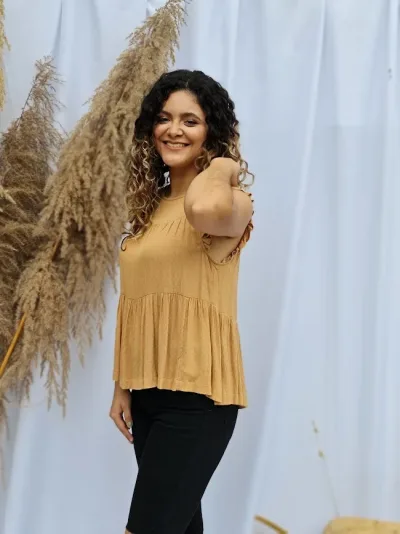 Blusa American Eagle para dama color camel
