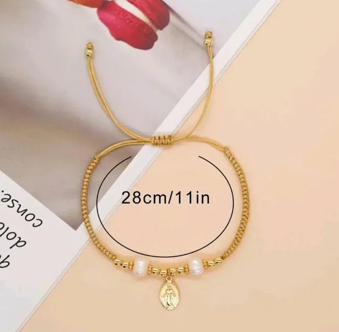 Pulsera tejida para dama color beige con dije de Jesús