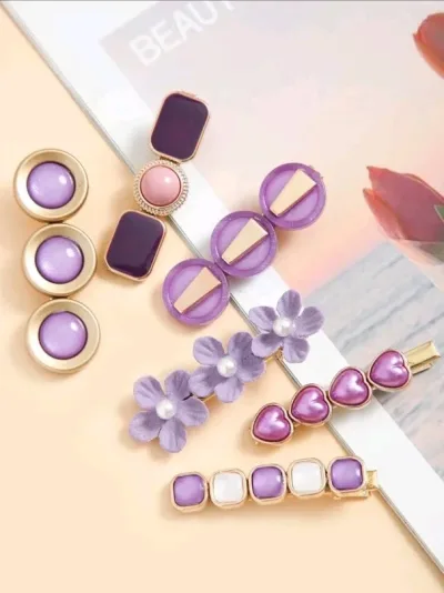 Set de prensas de cabello para dama diseño varios color morado y dorado