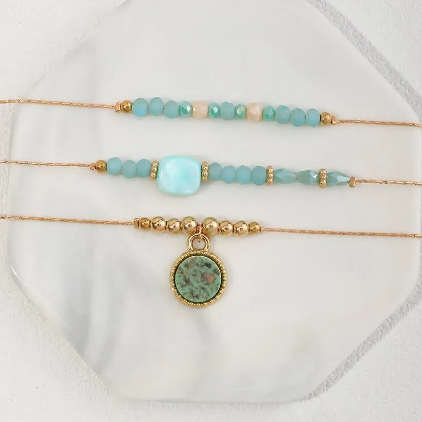 Set de pulseras para dama color dorado y celeste