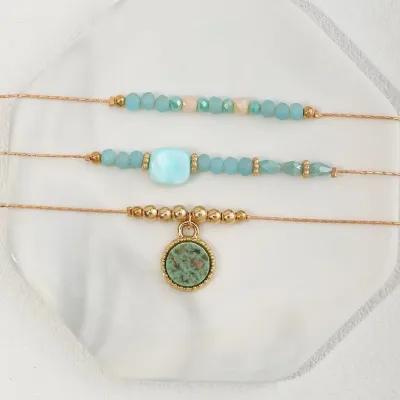 Set de pulseras para dama color dorado y celeste