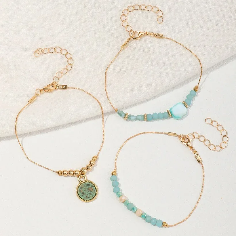 Set de pulseras para dama color dorado y celeste