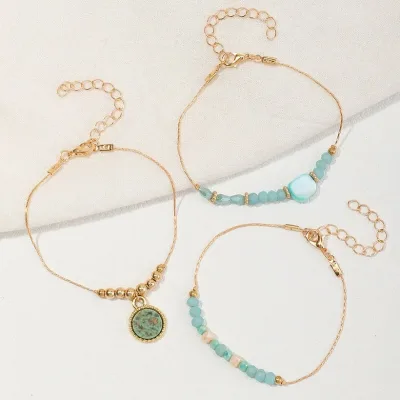Set de pulseras para dama color dorado y celeste