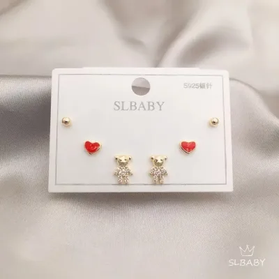 Set de aretes plata 925 con baño de oro diseño de oso y corazón