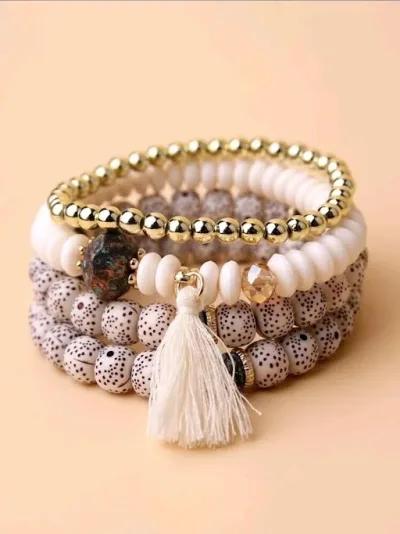 Set  de pulseras de fantasía  para dama color beige