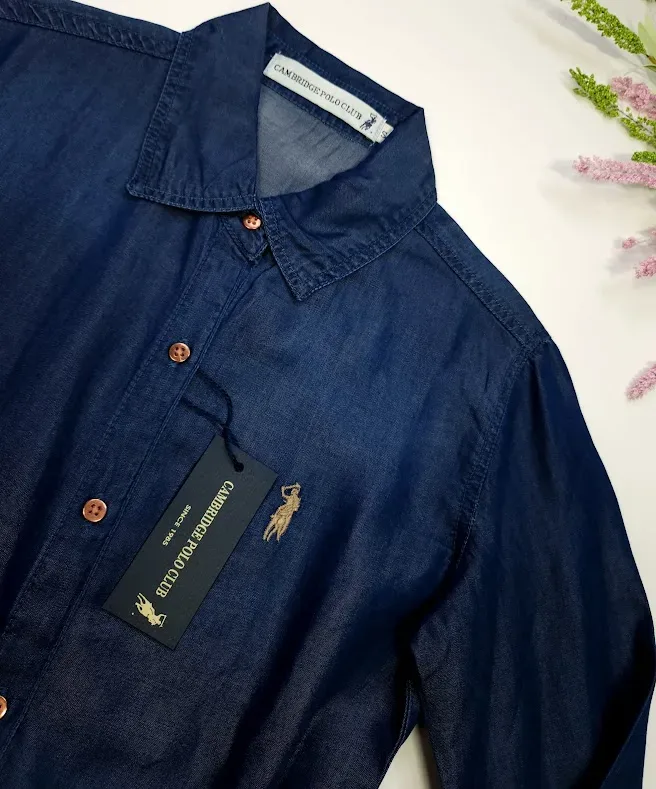 Camisa manga larga Cambridge Polo Club para dama color mezclilla oscura.