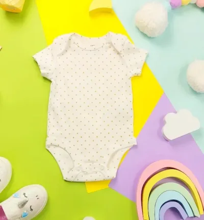 Mameluco Carter´s para niña color blanco con lunares dorados