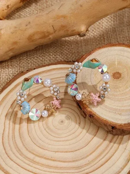 Aretes con diseño de mar de fantasía