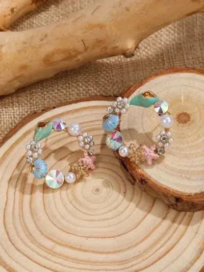 Aretes con diseño de mar de fantasía