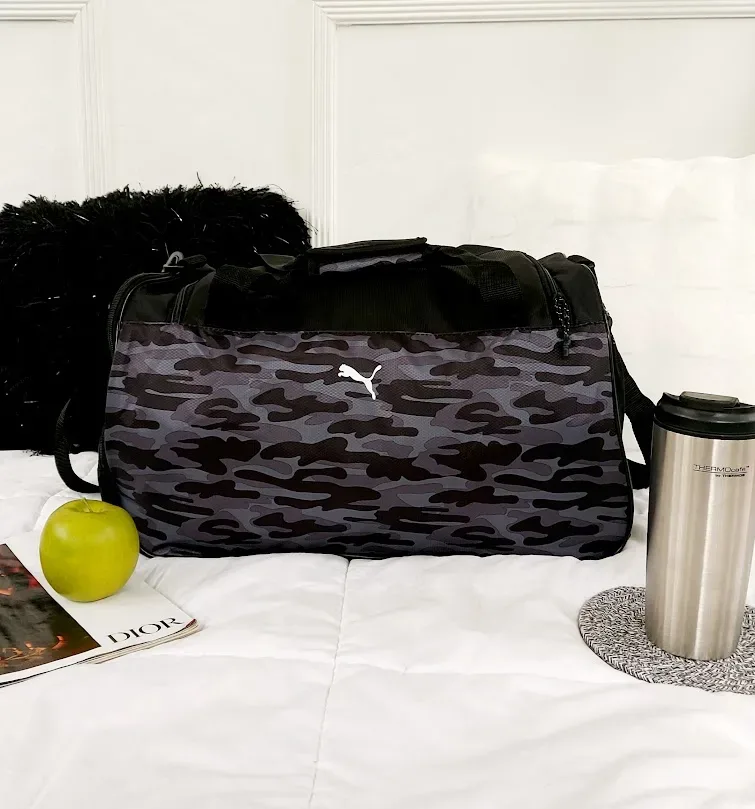 Bolso Puma para caballero color gris claro y negro