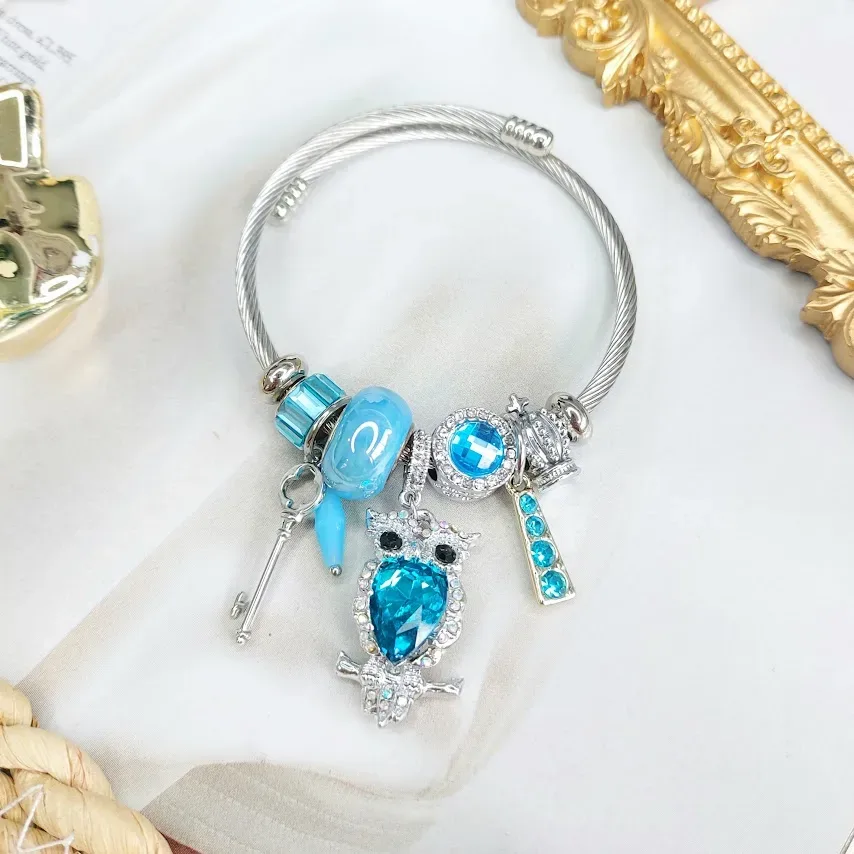 Pulsera de fantasía para dama con charms para dama