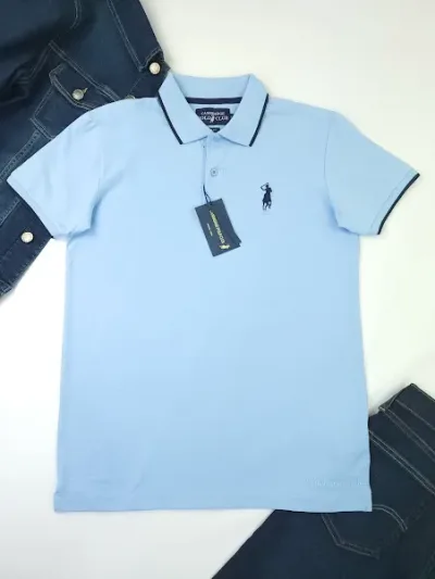 Camiseta Cambrige Polo Club para caballero color celeste.