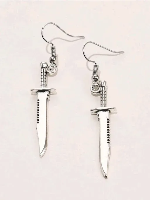 Par de aretes de fantasía para dama color plateado