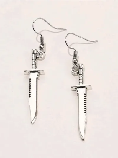 Par de aretes de fantasía para dama color plateado