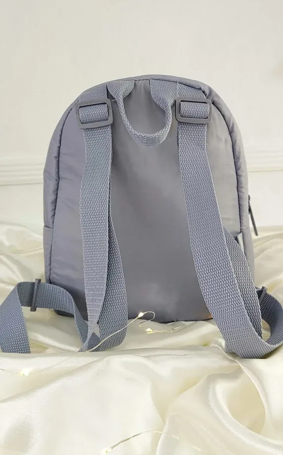 Mochila Reebok para dama color gris