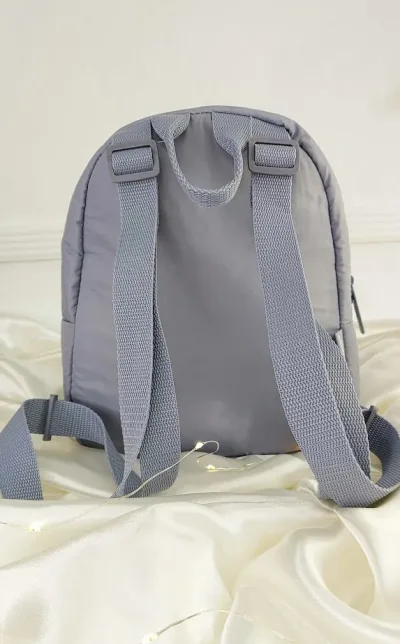 Mochila Reebok para dama color gris