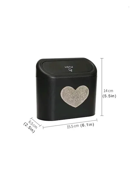 Basurero para coche con diseño de corazón de diamantes de imitación color negro y plateado.