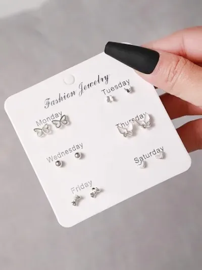 Set de 6 pares de aretes, dia de la semana.