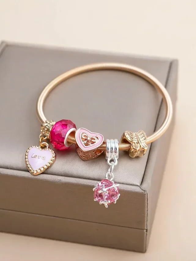 Pulsera de fantasía con diseño de corazón y de mariposa