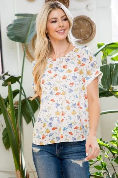 Blusa para dama con estampado de sombrillas