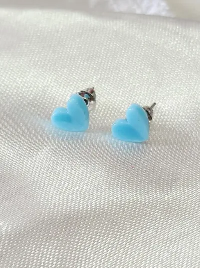 Par de aretes para dama diseño de corazón celeste
