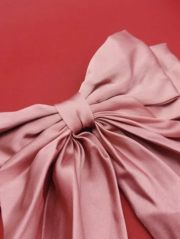 Prensa de lazo para dama color palo rosa