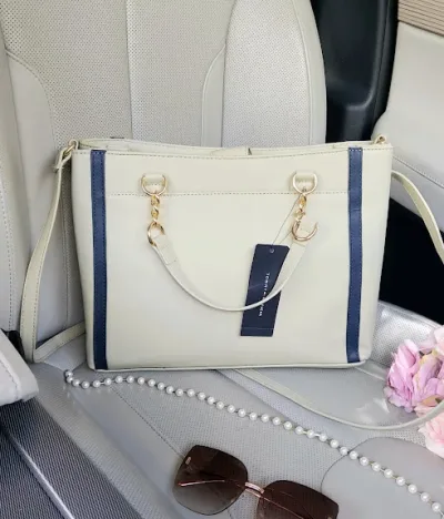 Bolso Tommy Hilfiger para dama color beige