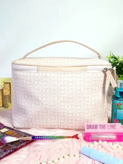 Cosmetiquera Tommy Hilfiger para dama color rosado