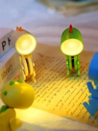 Pequeñas lamparas de escritorio con diseño de dinosaurio color al azar