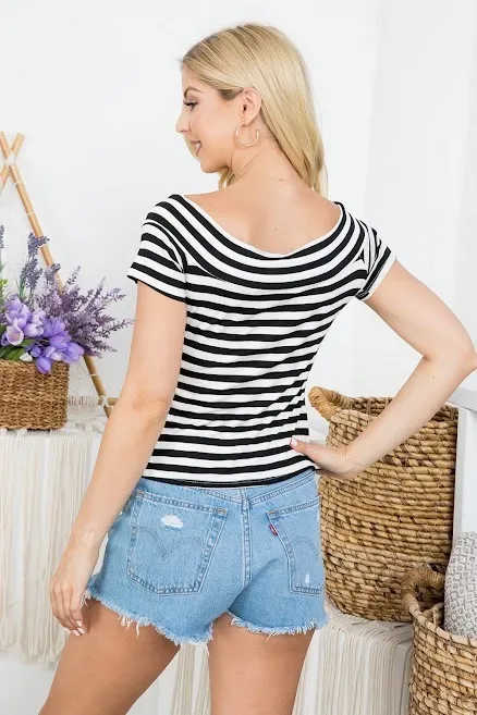 Blusa para dama diseño a rayas banco y nrego