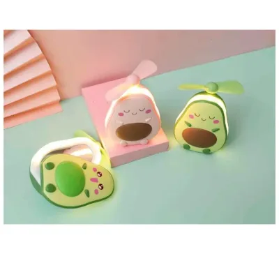 Espejo cosmético con ventilador en forma de aguacate semilla verde.