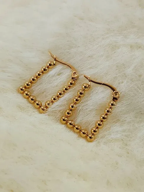 Argollas para dama de acero inoxidable con diseño de bolitas