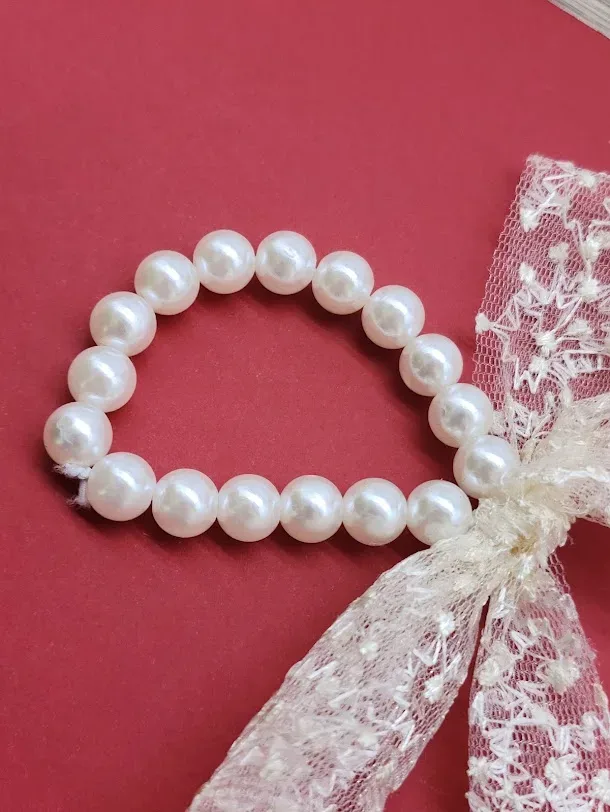 Cola de perlas blanco hueso
