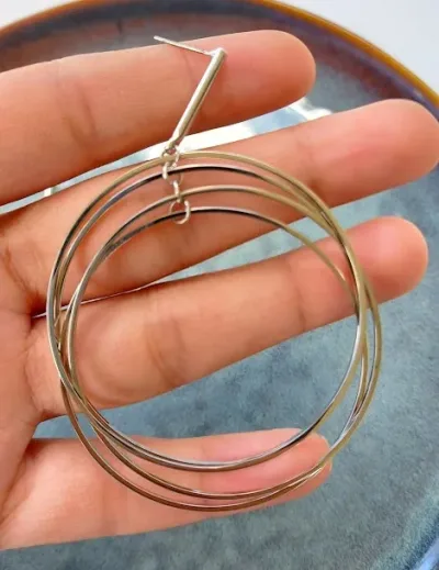 Par de aretes de fantasía para dama