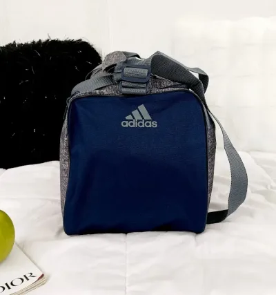 Bolso Adidas para caballero color gris y azul