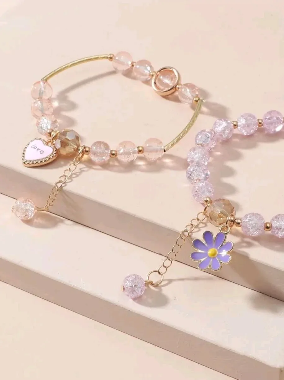 Pulseras con diseño de flor y corazón