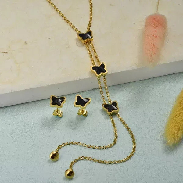 Conjunto de acero inoxidable para dama color dorado y negro