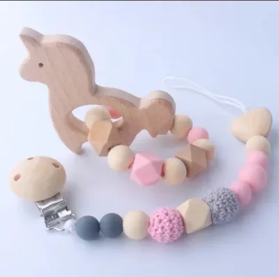 Estimuladores de encías para niña color beige y rosa