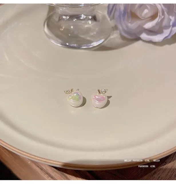 Aretes con diseño de manzana de cobre