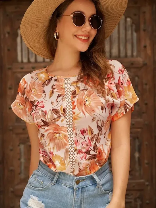 Blusa para dama color naranja con estampado floral