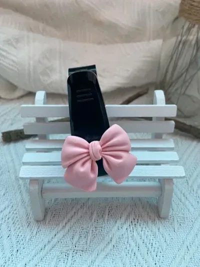 Clip soporte de gafas para coche diseño de lazo color negro y rosa