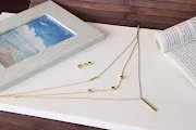 Conjunto de acero inoxidable para dama color dorado