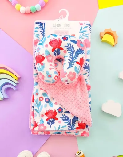 Conjunto de almohada y cobija con diseño floral