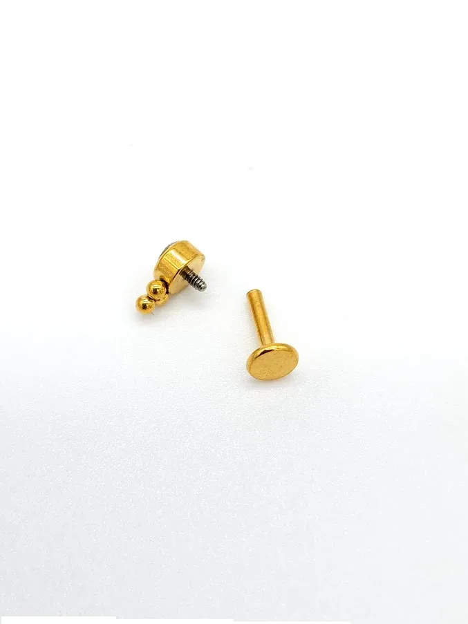 Piercing de acero inoxidable
