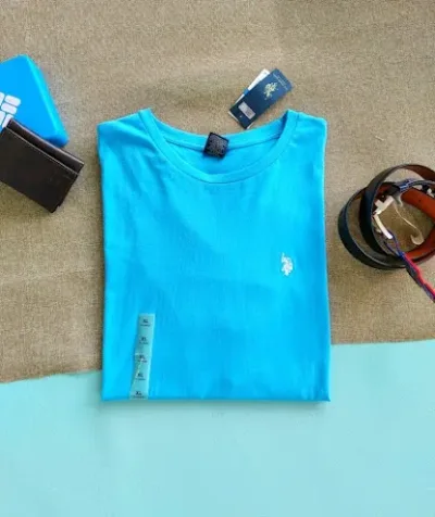Camiseta Polo para caballero color turquesa