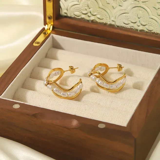 Argollas de acero inoxidable con perlas