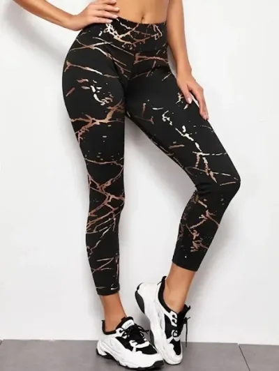 Licra deportiva para dama color negra con dorado