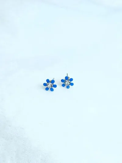 Par de aretes para dama diseño de flor celeste