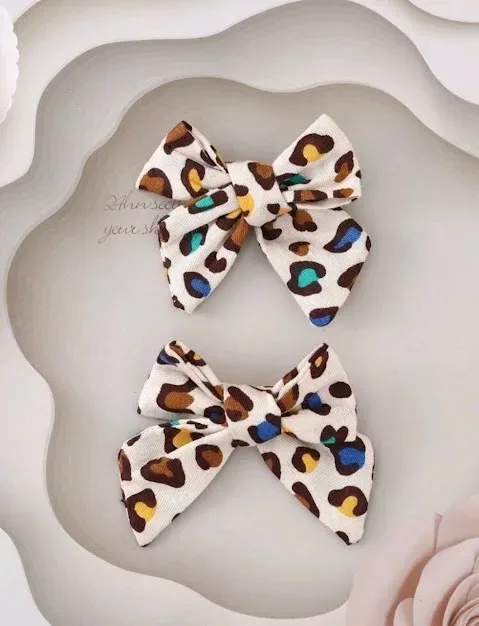 Set de prensas para niña con diseño de lazo