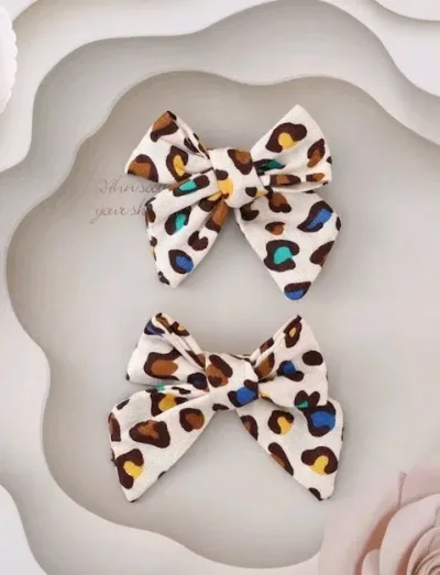 Set de prensas para niña con diseño de lazo